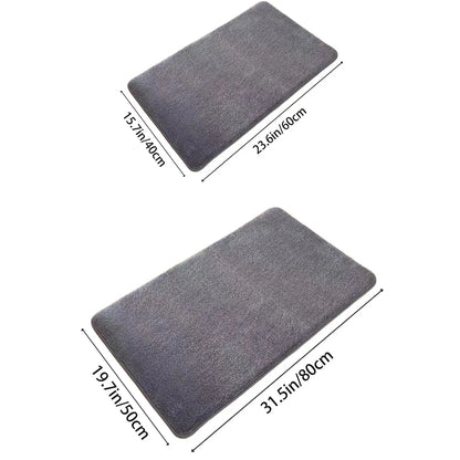 Folded grey bath mat showing its thickness