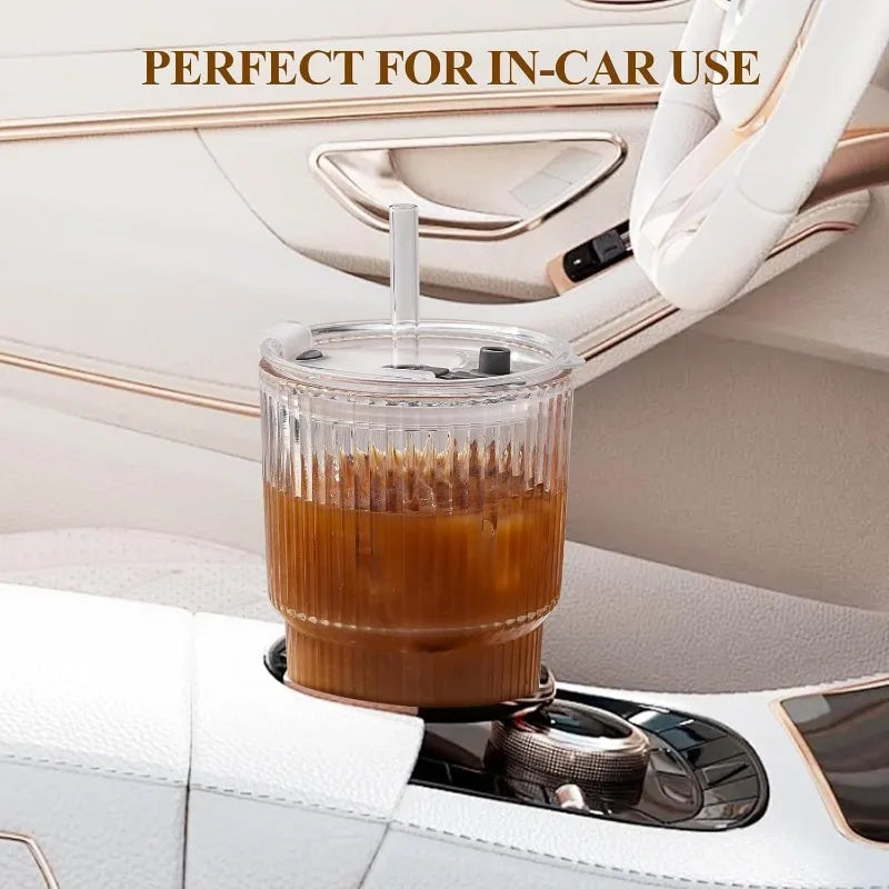 Ribbed glass drinking cup with lid and straw